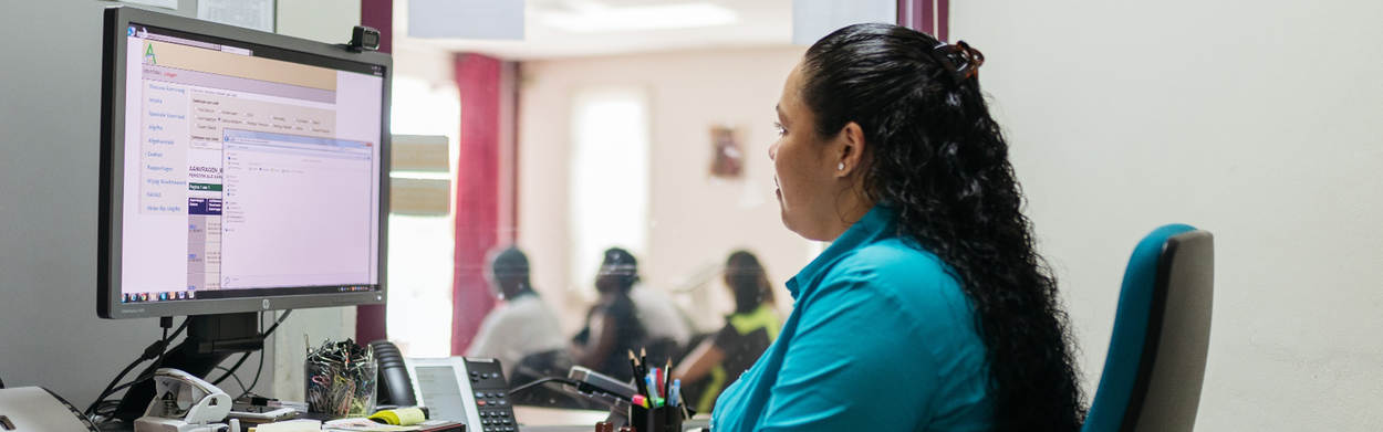 Woman behind computer