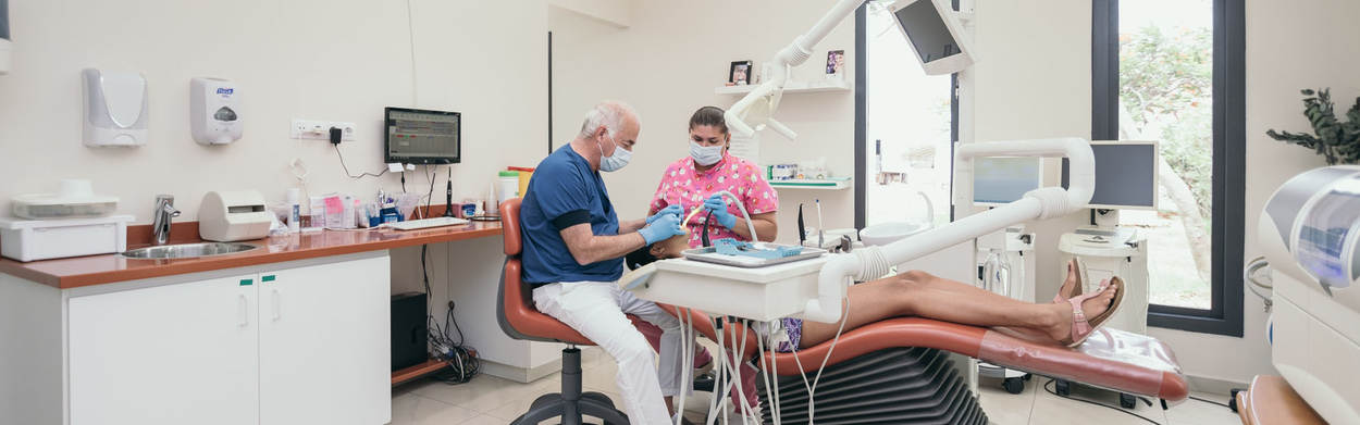 Woman being treated by dentist